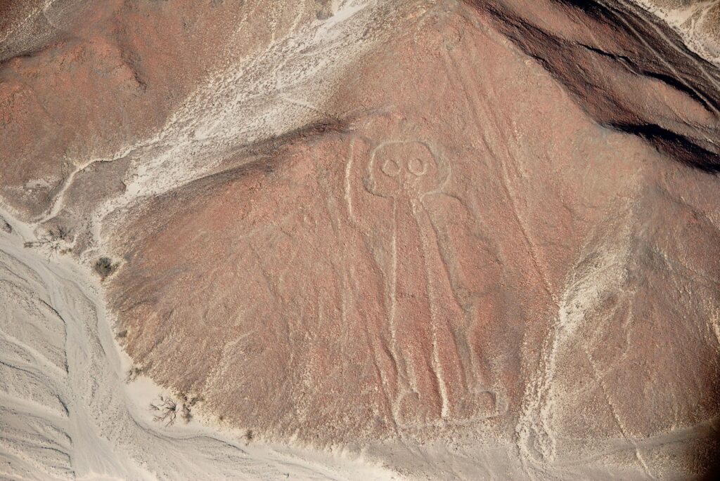 Aerial photograph of the famous Nazca Lines Astronaut geoglyph in Peru.